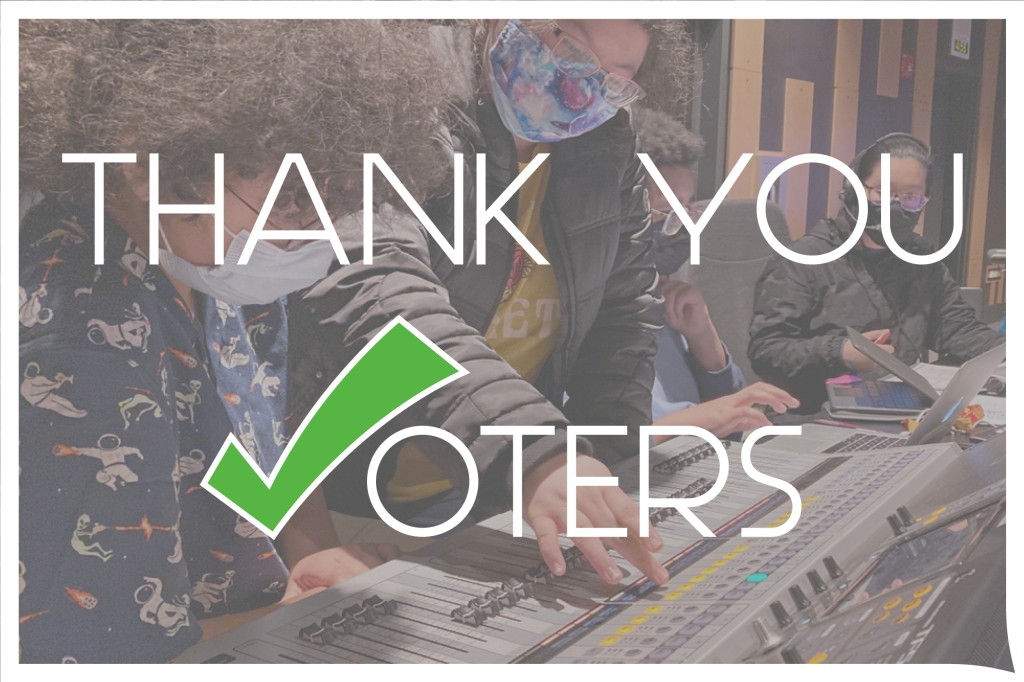 Thank You Voters graphic with blurred background of students working on keyboard mixer