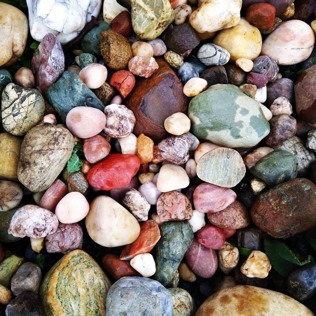 Grouping of colorful river rocks at Pants Creek in Olympia near Capitol forest